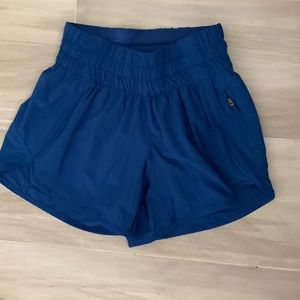 Lululemon,  size 0, 4 inch tracker shorts, royal blue excellent condition